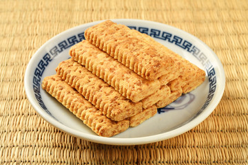 Salted yolk cake on the plate