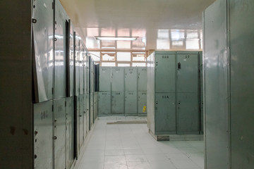 green lockers hallway with white floor