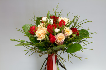 Beautiful bouquet in vintage style, light gray background, selective focus