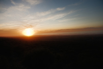 Dark beautiful nature outdoors sunset with sea waves and mountains in background