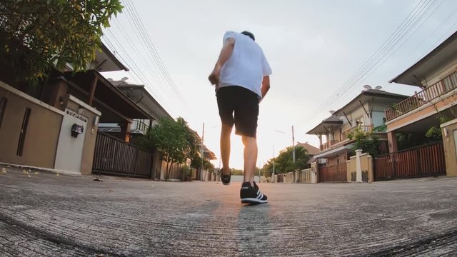 Asian man run and jumping jump over For active action freedom enjoying lifestyle success to exercise energy fit and expressions  emotional.