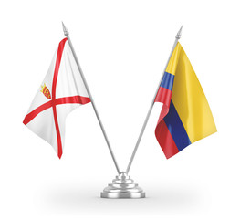 Colombia and Jersey table flags isolated on white 3D rendering