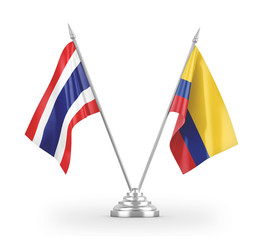 Colombia and Thailand table flags isolated on white 3D rendering