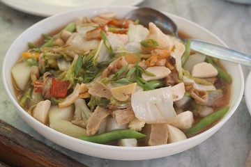 Pinoy Chop suey is a dish consisting of meat and eggs, cooked quickly with vegetables such as bean sprouts, cabbage, etc. Selective Focus.