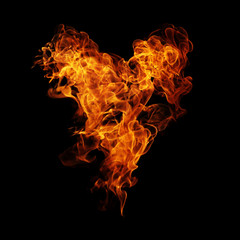 Fototapeta na wymiar Fire heart black background