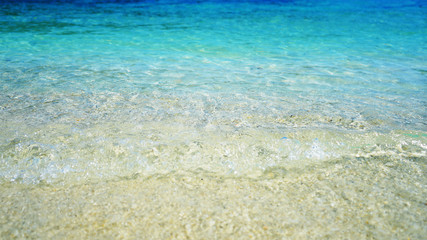 Beautiful blue water of the sea. Summer beach background.