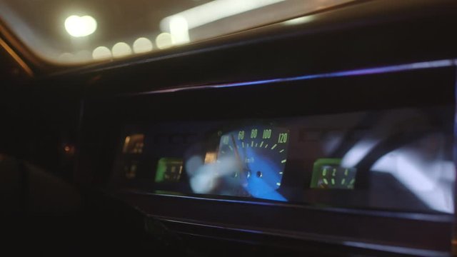 Close-up of dashboard in interior of moving old automobile in Russia. Stock footage. Retro cars and their interiors