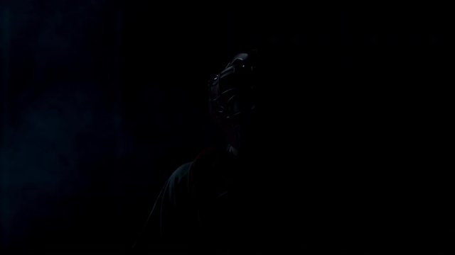 FIXED Caucasian professional baseball player catcher posing against bright lights. 4K UHD 60 FPS SLOW MOTION shot on ARRI Alexa Mini with Cooke S4 lens