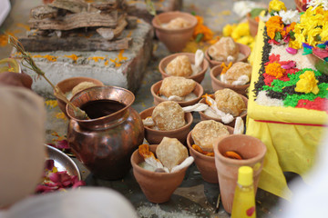 indian pooja prayer traditional culture with jaggery and flowers