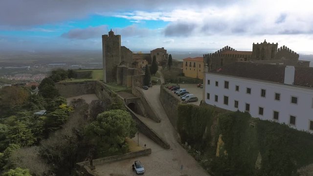 Aerial panorama view of Palmela castle pousada with stunning blue sky and old wind mills near Setubal Portugal