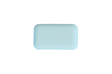 Soap on a blue background. Hygiene and cleanliness. Soap for bath, laundry and body care. Personal hygiene products. Bathroom accessories. Isolate