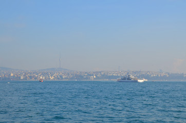 Fototapeta na wymiar A cruise across or along the Bosphorus is the best way to explore Istanbul skyline. 