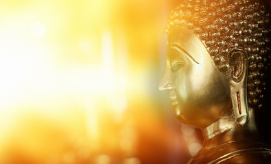 Selective focus  close-up shots of of the Buddha images with soft light and layout design for a...