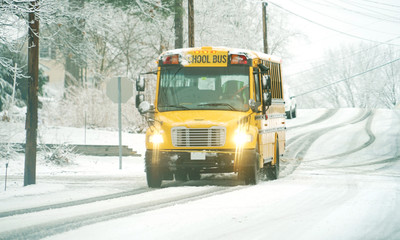 school bus in the snow storm day