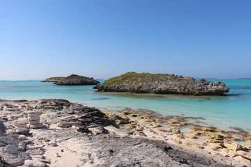 Fototapeta na wymiar Small rocky islets off the coast of North Caicos - Three Mary Cays caribbean ocean view