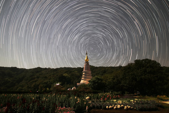 The stars night of startails over Phra Maha Dhatu Naphaphonphumisiri Pagoda at Doi Inthanon Chiang Mai, Thailand.