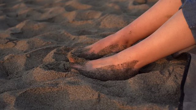 Young Girl Feet in the sand