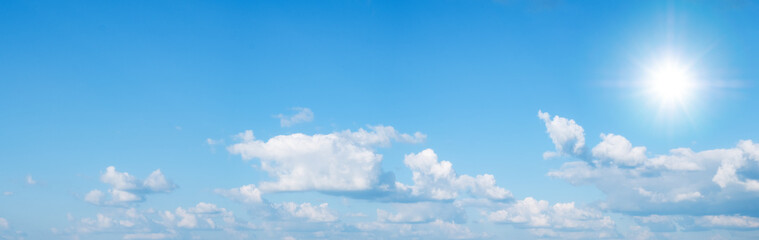 Obraz premium Beautiful blue sky with white clouds and sun panorama