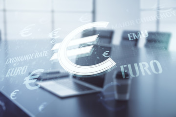Euro symbol on the background of the desktop with computer, multi exposure