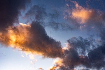 Evening sky with black clouds. Evening sky with white clouds.