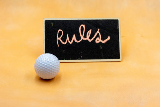Rules of golf is on orange  background