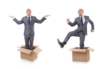 Businessman with box isolated on the white