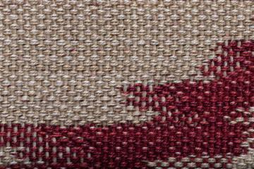 Fototapeta premium Beige red canvas texture background. Highly detailed photograph of fabric