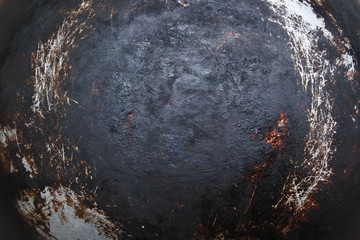 the surface of the pan is charred