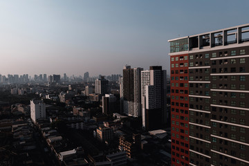 Fototapeta na wymiar Bangkok Cityscape building at sunset an high way