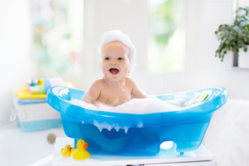 Little baby taking a bath