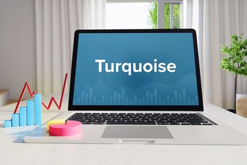 Turquoise – Business/Statistik. Laptop im Büro mit Begriff auf dem Monitor. Finanzen/Wirtschaft.