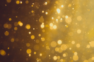 Dark Abstract Gold bokeh sparkle on black