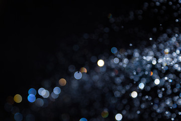 Vintage blur bokeh defocused on black