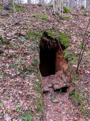 fragments of wooden doors in the sandstone wall