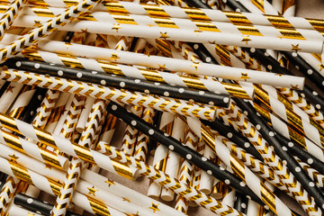 Lot of paper straws. Top view. Party concept.