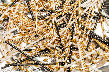 Lot of paper straws. Top view. Party concept.