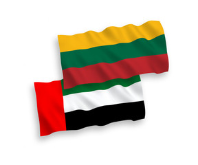 National vector fabric wave flags of Lithuania and United Arab Emirates isolated on white background. 1 to 2 proportion.