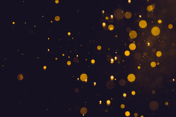 Dark Abstract Gold bokeh sparkle on black