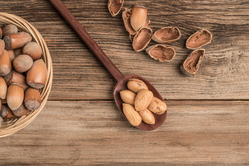 fresh hazelnuts on a wooden table with copy space