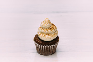 Tasty cupcake isolated on a white background