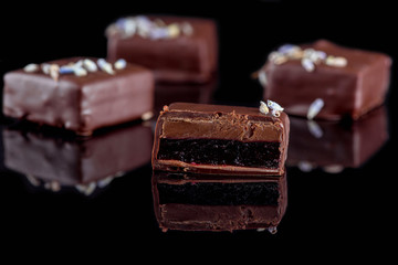  Delicious handmade sweets with chocolate and fruit filling. Close-up.