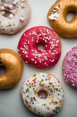 American donuts with icing, Fat Thursday, candy