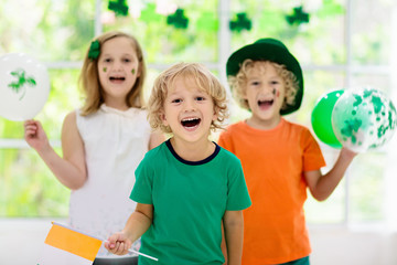 Kids celebrate St Patrick Day. Irish holiday.