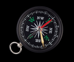 Compass isolated on black background. Adventure, discovery, navigation, communication, logistics, geography, transport and travel theme concept symbol.