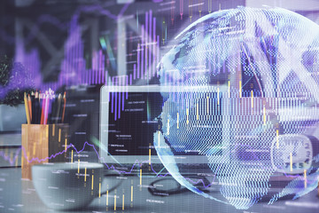 Double exposure of graph and financial info and work space with computer background. Concept of international online trading.