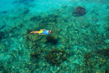 Kids snorkel. Children snorkeling in tropical sea.