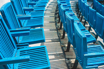 Blue wooden seats