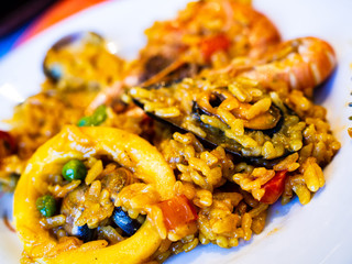 Paella seafood on wooden background