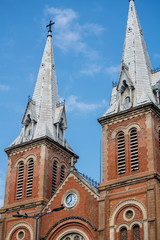 Fototapeta na wymiar Vertical image of Notre-Dame Cathedral Basilica of Saigon