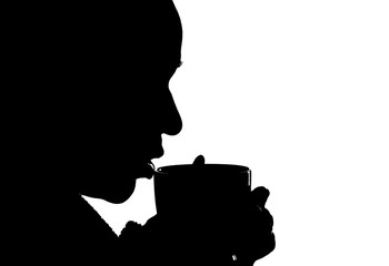 black silhouette of a girl on a white background who is drinking a hot drink from a mug
